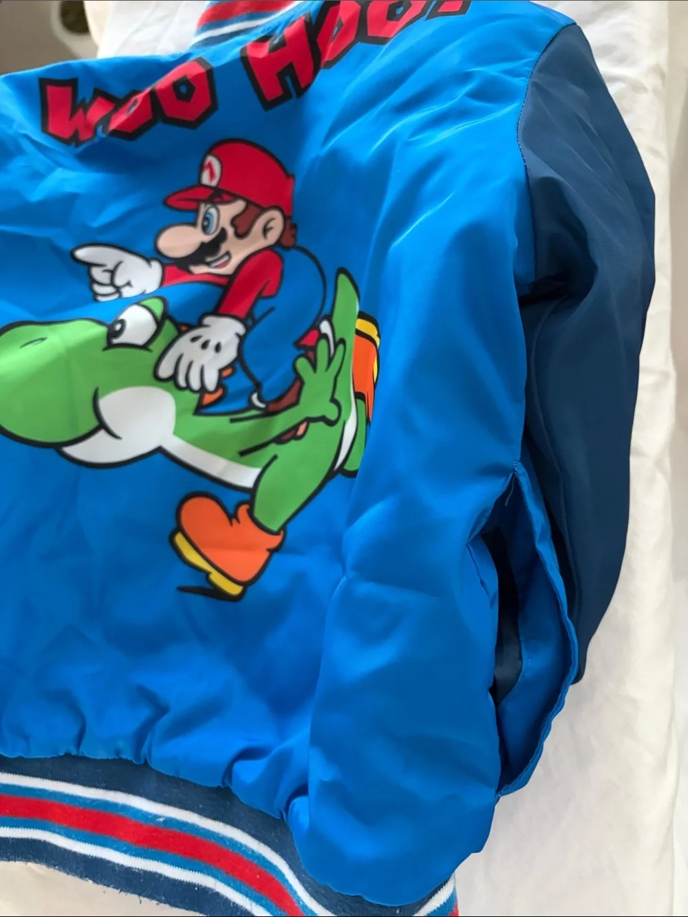 Nintendo Super Mario Blue Quilted Jacket with Red & White Stripes